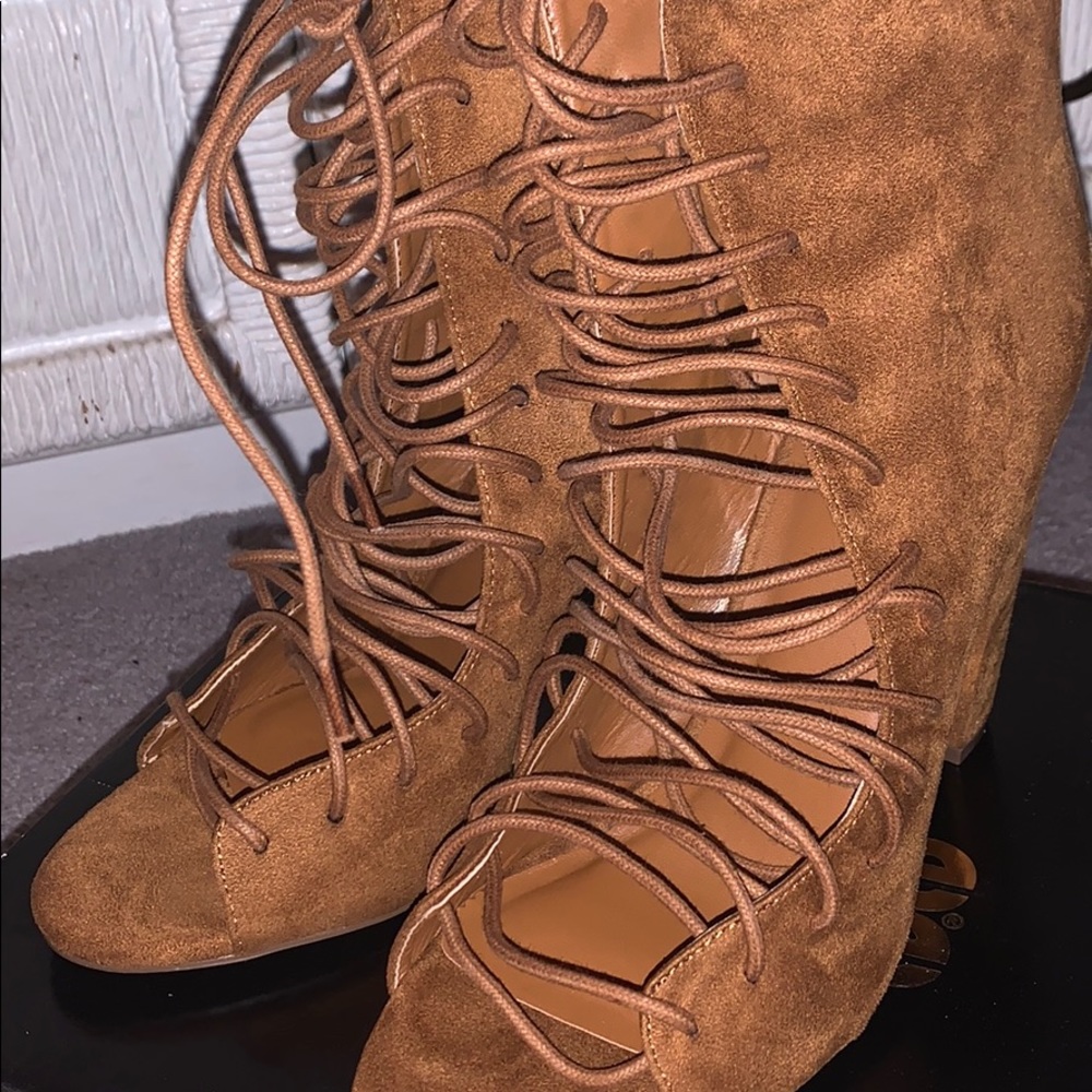 Heels with laced up front